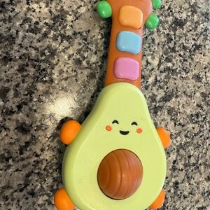 Skip hop Kids Avocado Musical Rattle Toy - Green